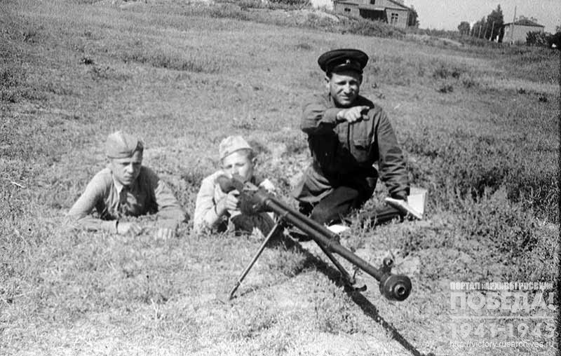 Crew of an anti-tank rifle of pre-conscripts during training with the senior instructor of Vsevobuch K. Shevtsov