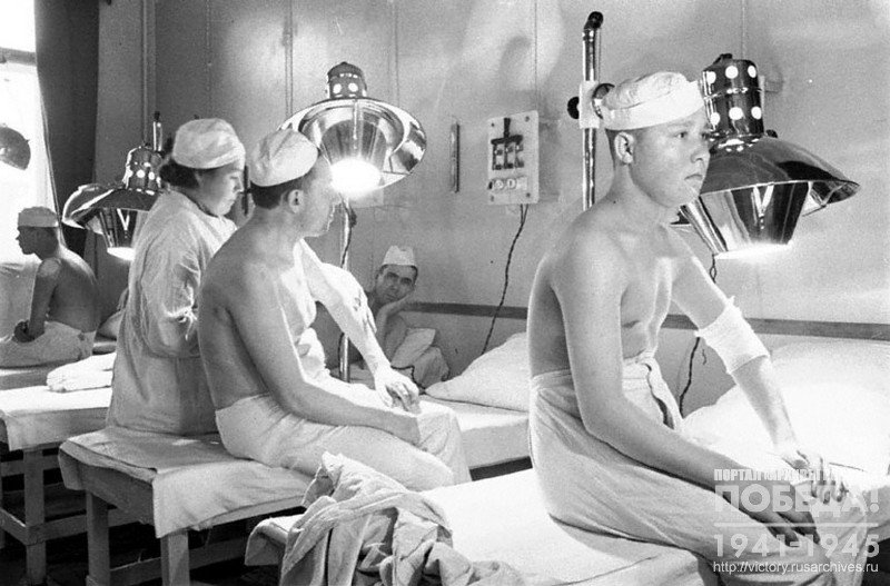 Injured soldiers taking quartz irradiation in the hospital