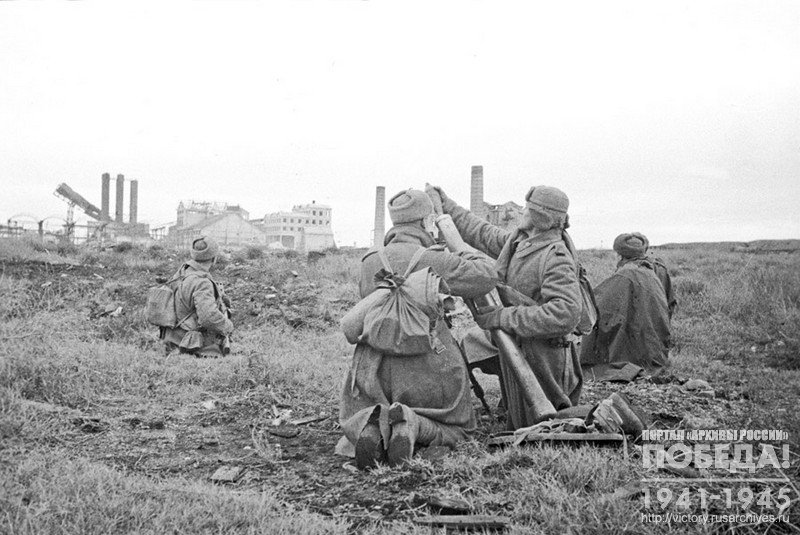 Mortars are firing at the enemy, positioned in the shops of the Voykov plant. Kerch, 1944