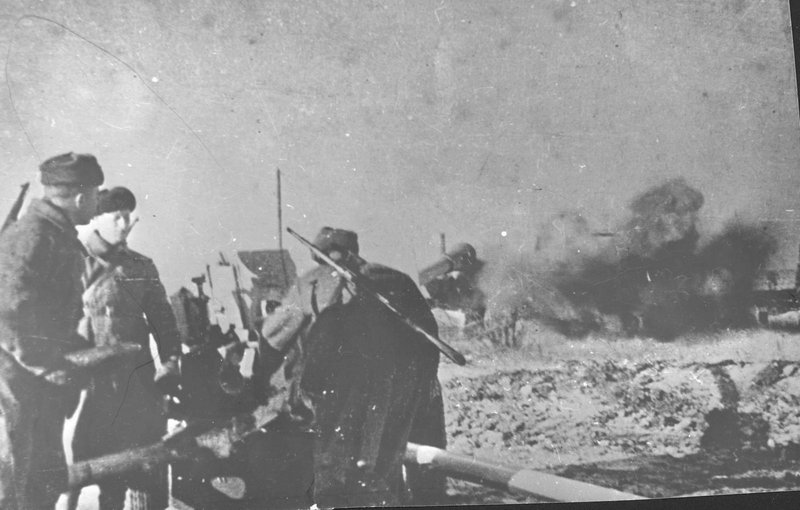 Artillerymen of the 34th Guards Rifle Regiment of the 13th Guards Rifle Division of the 62nd Army fire on enemy
