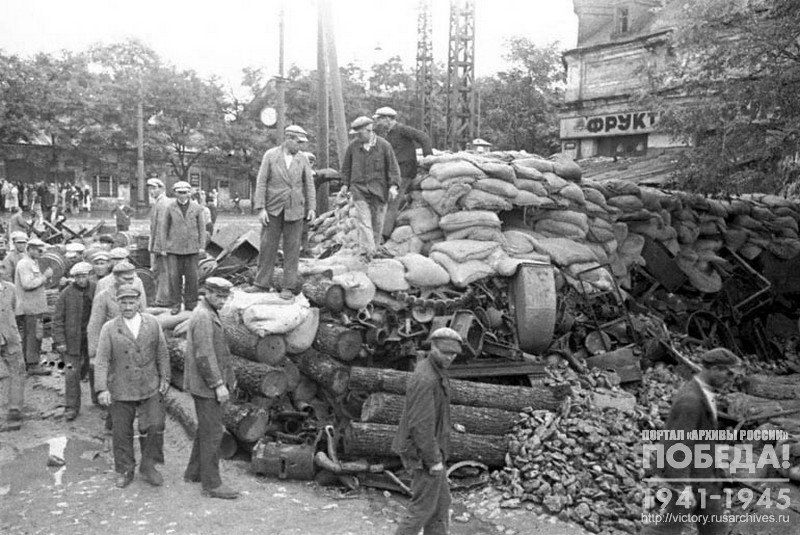 Participants in the defense of city Odessa building barricades