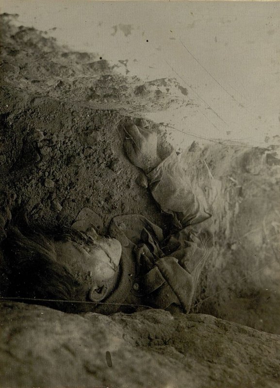 Image: The corpses of Germans killed by shell fragments and a German cemetery in the village of Maslovo. Most of the crosses in the cemetery have inscriptions dated 5.7 and 6.7.43.