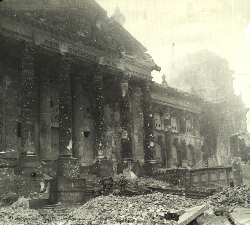 One of the assault groups is attacking of the Reichstag Building with the Victory Banner