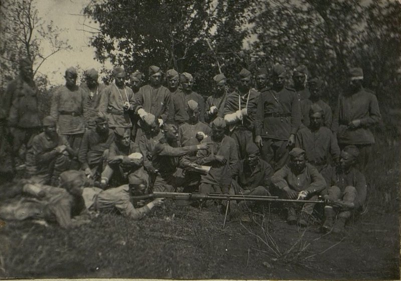 Image: 2nd battalion. The commander of the 1st company, junior lieutenant comrade Leontyev gives target designation to the Red Army soldier Ivanov for aiming an anti-tank rifle