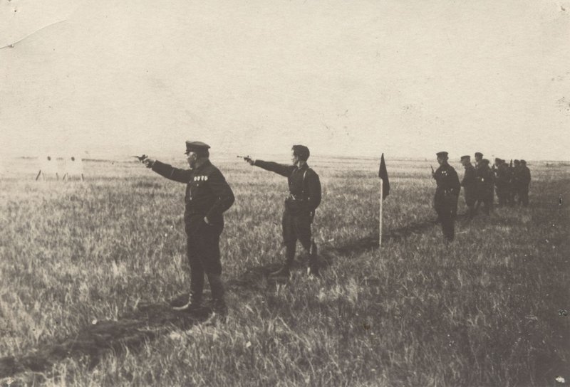 "K. Voroshilov Shooting from Nagant Revolver at Firing Line"