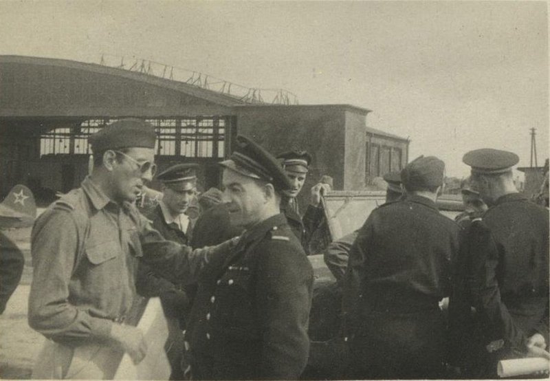 Pilots of the Normandie-Niemen regiment discuss the upcoming flight. On the left, with glasses - M. Guido. Germany, Elbing, June 1945