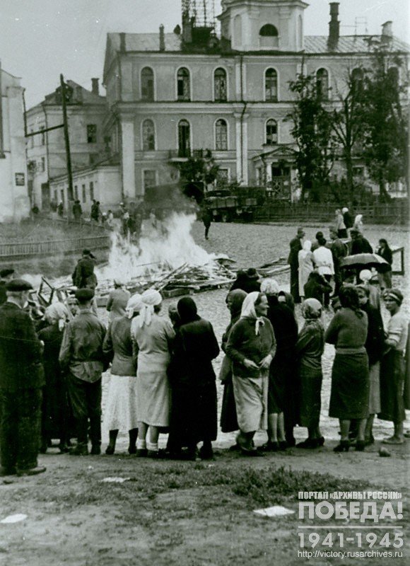 German soldiers burn the exhibits of a local history museum